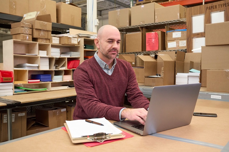 Small-business owner using payment technology